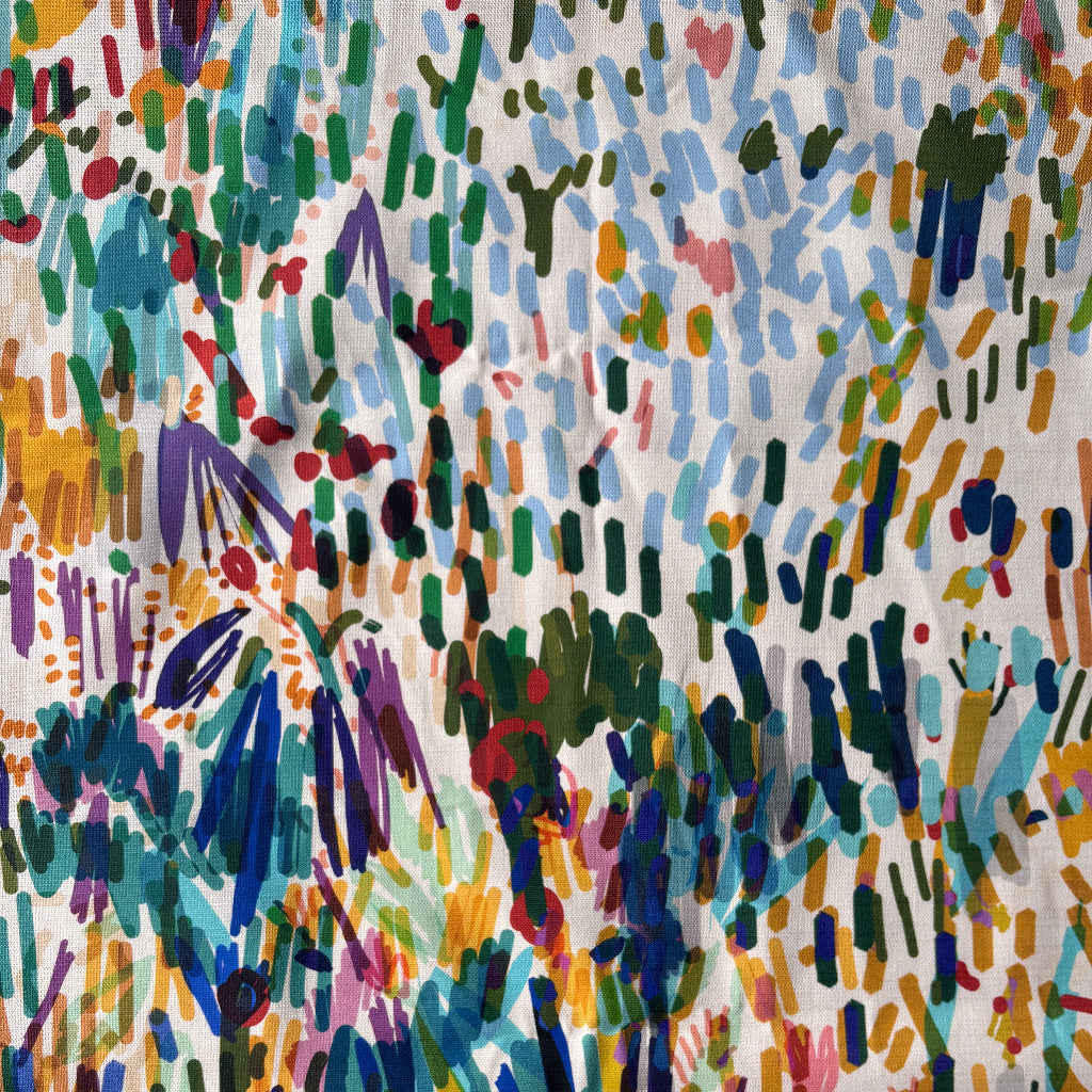 Colorful abstract pattern on a textured fabric background