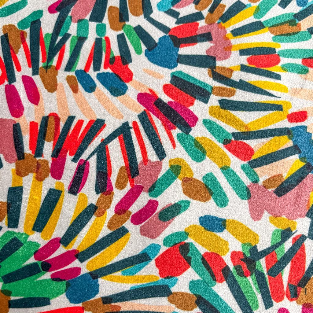 Colorful abstract pattern on a fabric surface