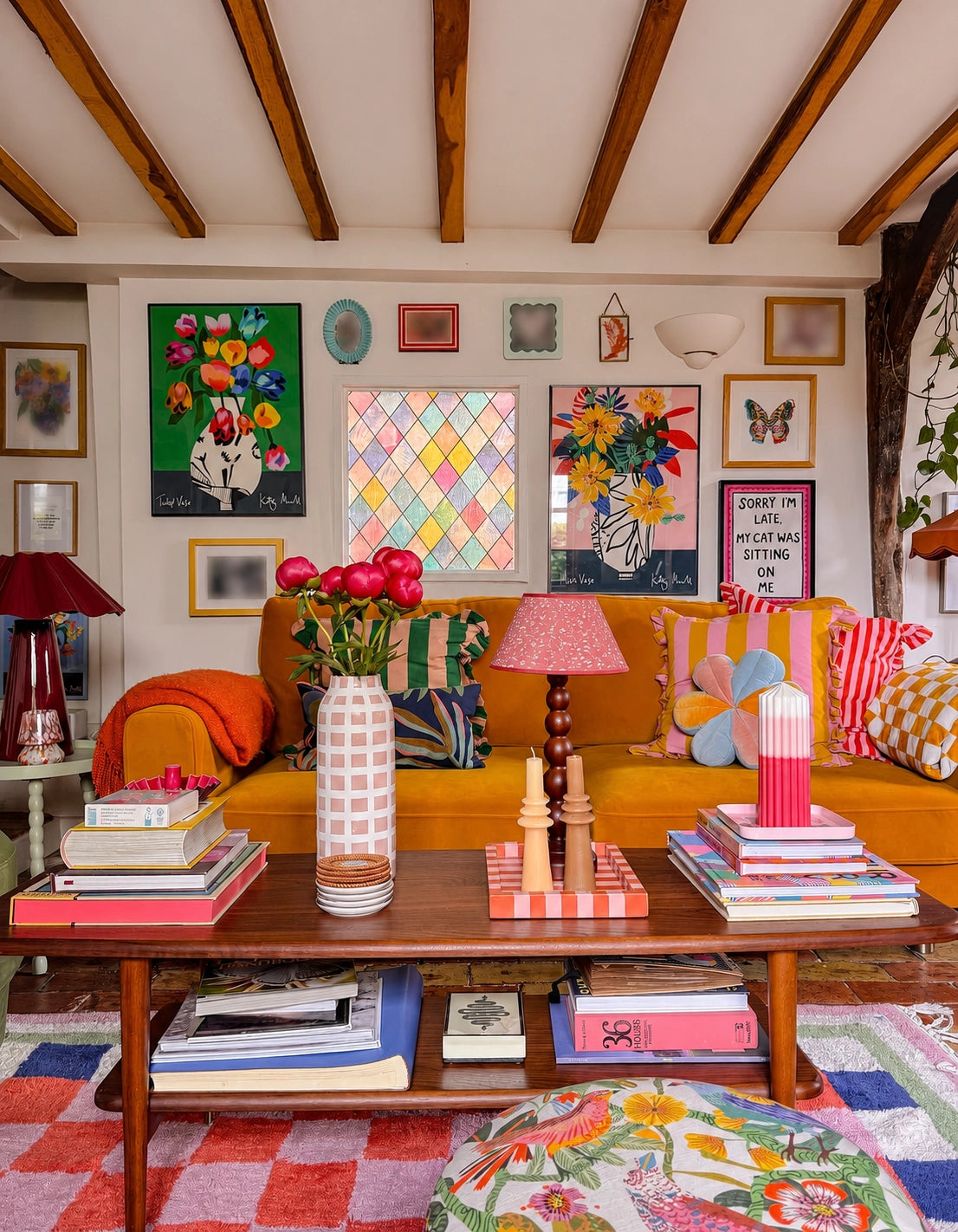 Miro Vase and Tulip Vase fine art prints by Kitty McCall displayed in a colourful eclectic living room with oak beams, mustard sofa and vibrant gallery wall