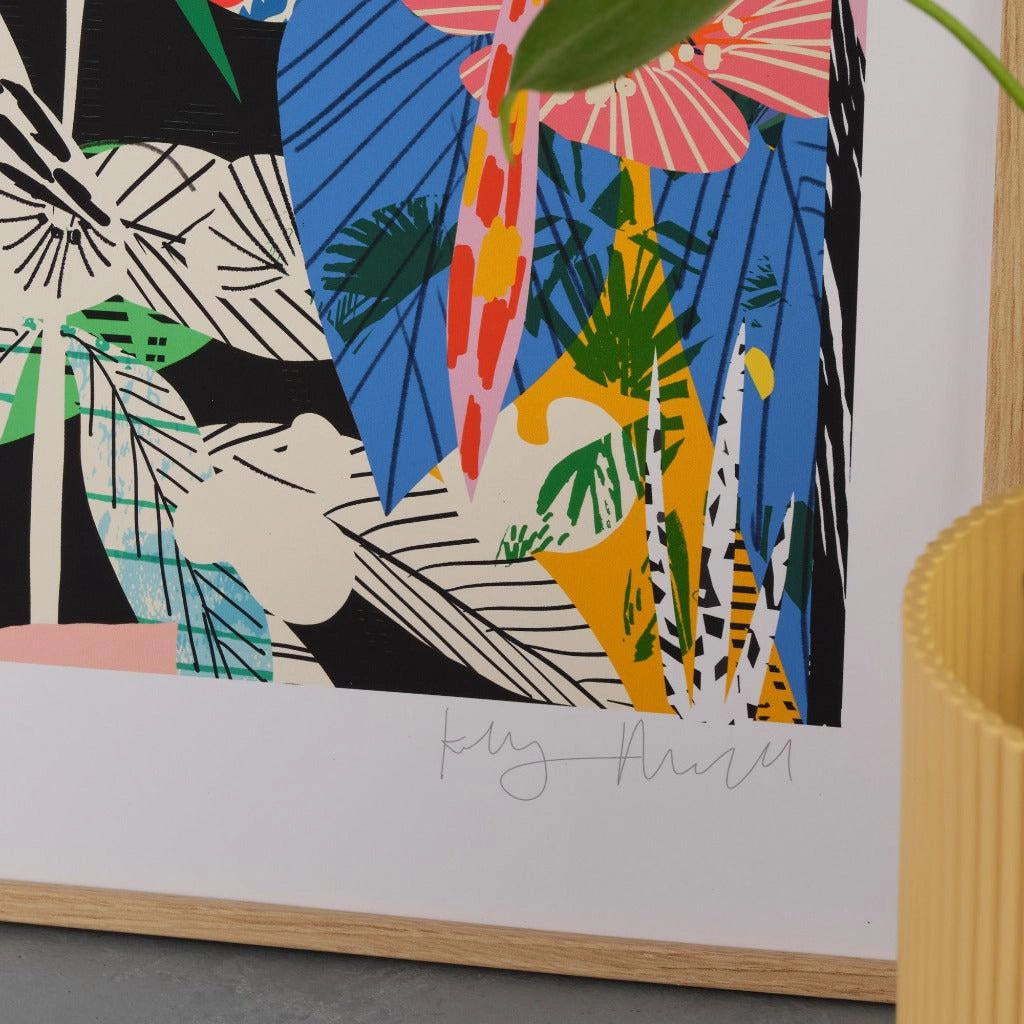 Close-up detail of the Etruscan Forest fine art print by Kitty McCall showing bold pink and orange blooms with hand-drawn leaf patterns, with artist signature