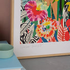 Close-up detail of the Etruscan Forest fine art print by Kitty McCall showing layered pink poppies and zebra-stripe botanical foliage