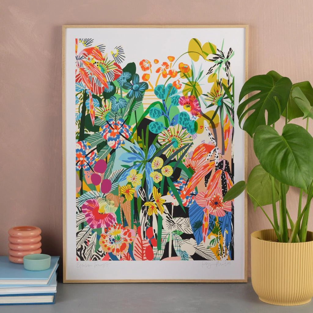 Etruscan Forest fine art print by Kitty McCall in a natural oak frame, styled against a dusky pink wall with a monstera plant