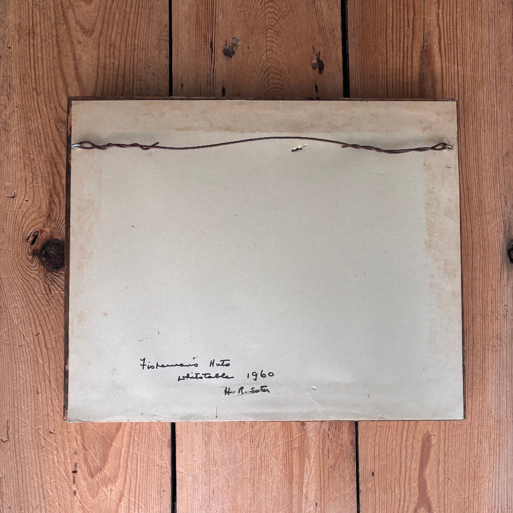 White sheet of paper with text on a wooden surface