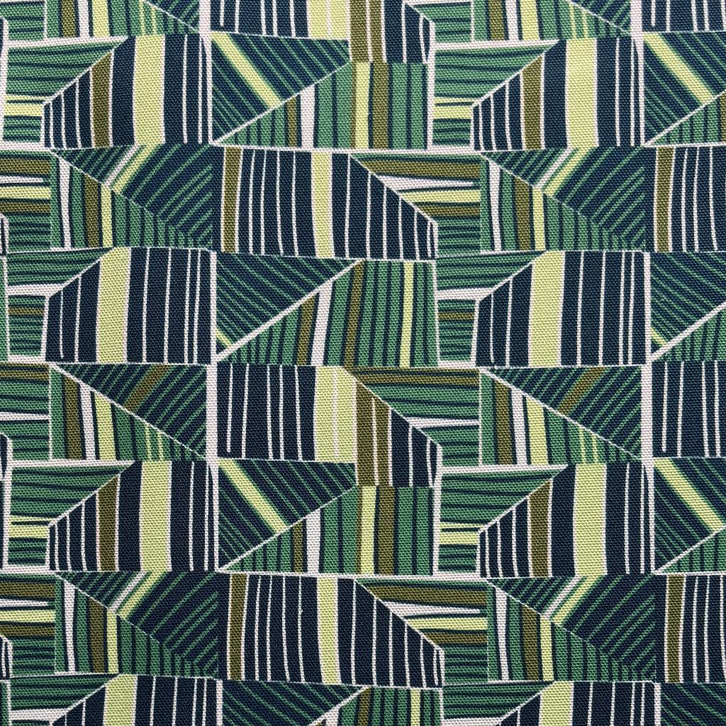 Geometric patterned fabric with green and blue tones