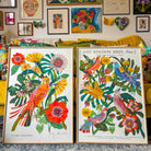 botanical bird art print displayed in living room interior