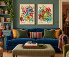 Flower Study No. 1 and Flower Study No. 2 fine art prints framed in natural oak, styled in a living room