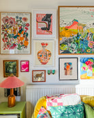galleery wall with colourful artwork